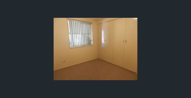 TWO BEDROOM DUPLEX WITH ENCLOSED BACK YARD - Photo 1