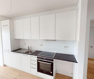 Rollstuhlgerechte Wohnung mit 2 Zimmern und Einbauküche zum Erstbezug! - Photo 5