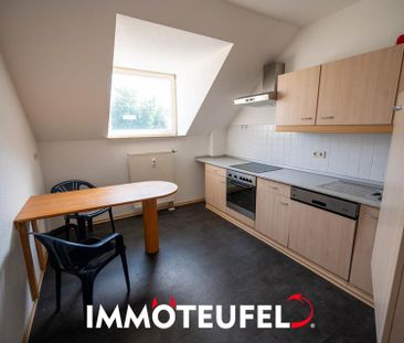 Helle 3-Zimmer-Maisonette im Dachgeschoss mit Einbauküche, Badewann... - Foto 1