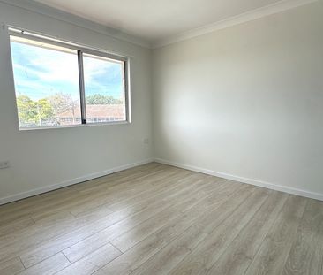 FULLY RENOVATED FLOOR 2 BEDROOM UNIT 500M TO AUBURN STATION - Photo 2