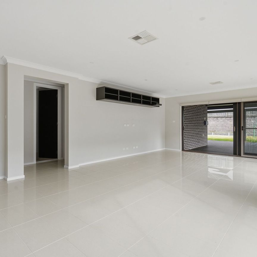 Spacious Family Home with Multiple Living Areas - Photo 1