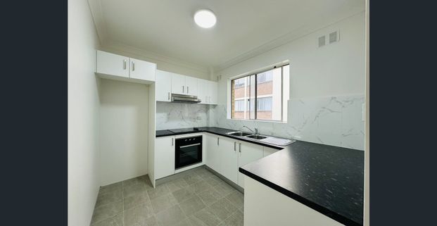 Renovated Two Bedroom Apartment in a Prime Location - Photo 1