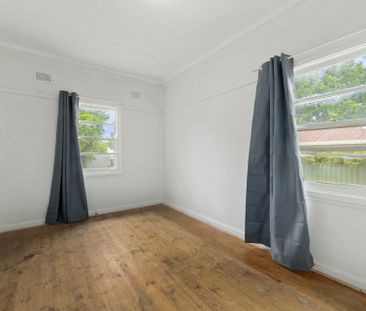 Charming 3-Bedroom Home in Prime Ainslie Location - Photo 6