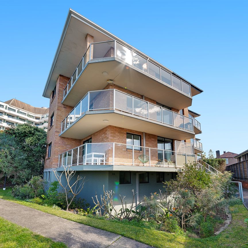 Renovated Beachside Elegance with Ocean Views - Photo 1