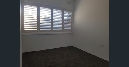 COMPLETELY RENOVATED - Photo 2