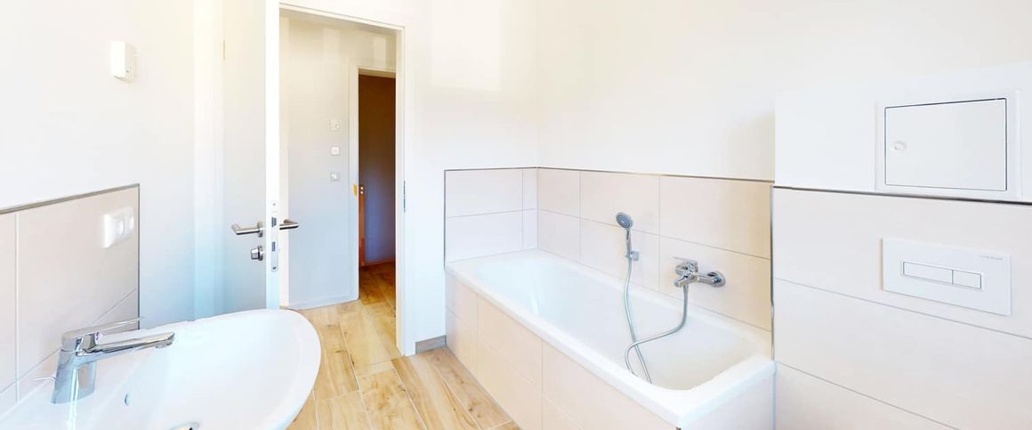 Neubau-Doppelhaushälfte mit durchdachtem Grundriss, Fußbodenheizung und großem Garten in Ottersleben - Foto 1