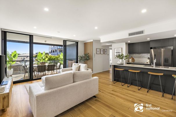 STUNNING TWO BEDROOM UNIT LOCATED ON THE ESPLANADE AT BEAUTIFUL REDLAND BAY - Photo 1