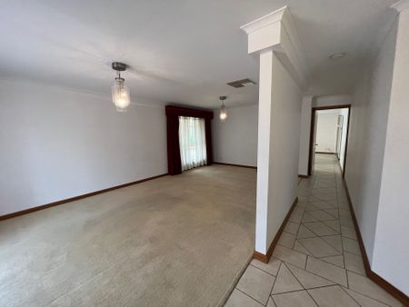 Large 4 Bedroom Home with 2 Living Areas! - Photo 2