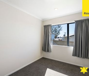 This beautifully renovated three-bedroom home in Ranui is ready for... - Photo 4