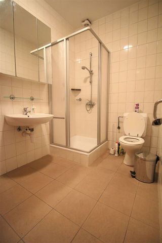 Gelijkvloersappartement met 1 slaapkamer en tuin in centrum Merksem - Photo 3