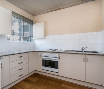 Modern First-Floor Unit with Pool Access - Photo 5