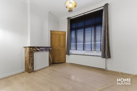 Ruim éénslaapkamer appartement met uniek zicht op het astridpark en de Sint Maartens Kathedraal te Ieper - Foto 2