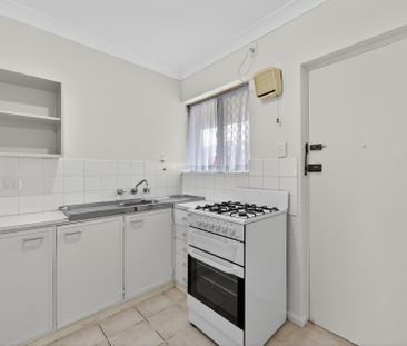 Freshly Updated Apartment in a Fantastic Location! - Photo 2
