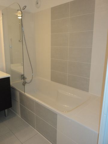 Location Appartement 4 pièces 86m² - Photo 2
