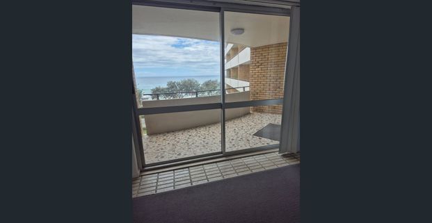 LOCATED IN THE HEART OF SURFERS IN THE HISTORICAL “ THE SANDS “ BUILDING IS THIS DELIGHTFUL 5TH FLOOR UNIT LOOKING OVER SURF VIEWS ACROSS THE STR - Photo 1
