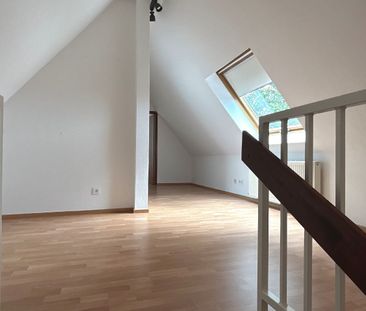 Pfiffige Maisonettewohnung mit Südbalkon und Garage in der Leverkusener Waldsiedlung! - Photo 2