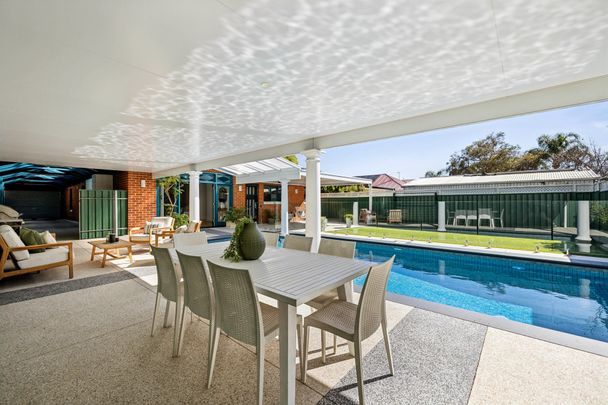 Open the door to resort-style living, close to everything that matters - Photo 1