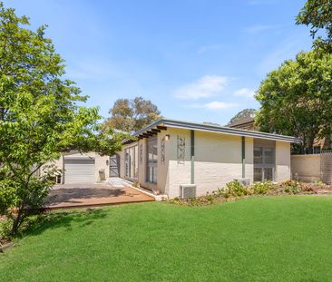 Beautifully Renovated Four-Bedroom Home with Spacious Outdoor Living - Photo 1