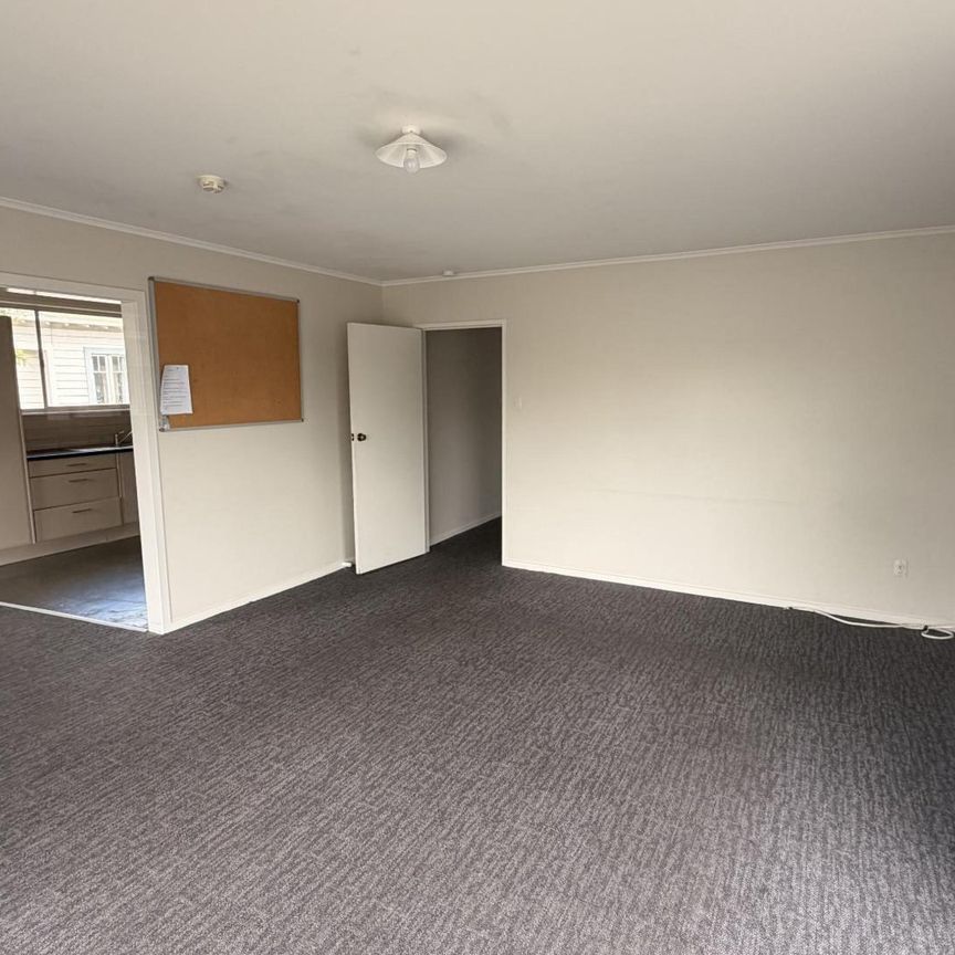 Spacious 7-Bedroom Home in the Heart of Town - Photo 1