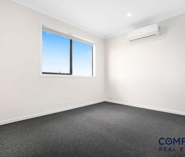 Beautifully Designed Four-Bedroom Home with Modern Comforts - Photo 1