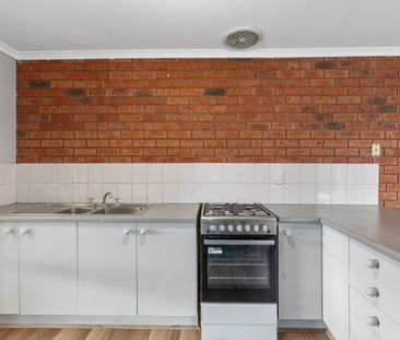 Presentable 2 bedroom unit with outdoor space and carport - Photo 4