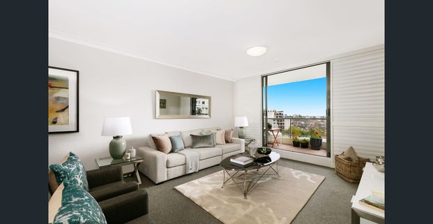 "Modern, Light-Filled Unit with Stunning Views in a Convenient Location - Photo 1