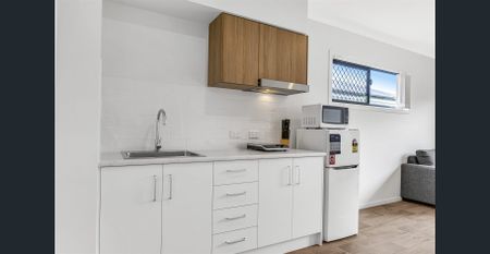 NEAR NEW FURNISHED STUDIO - Photo 5