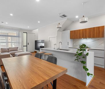 Modern Near-New Townhouse with Solar, Dual Living Spaces & Low-Main... - Photo 2