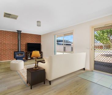 COMFORTABLE FAMILY HOME - Photo 1