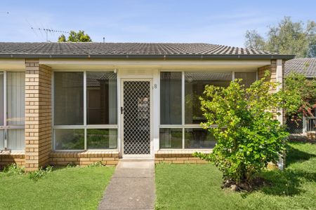 Tidy Two-Bedroom Unit in the Heart of Town - Photo 5