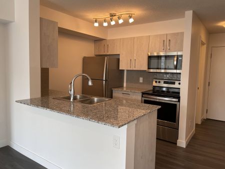 2 Br Condo For Rent In Skyview Ranch W/ Undgr. Parking/ In Suite Laundry. - Photo 3