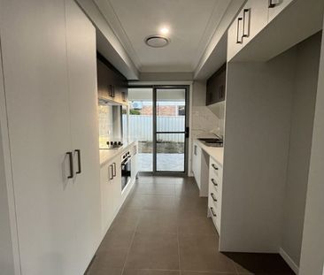 Stylish Modern Home with Ducted A/C & Water Included - Photo 5