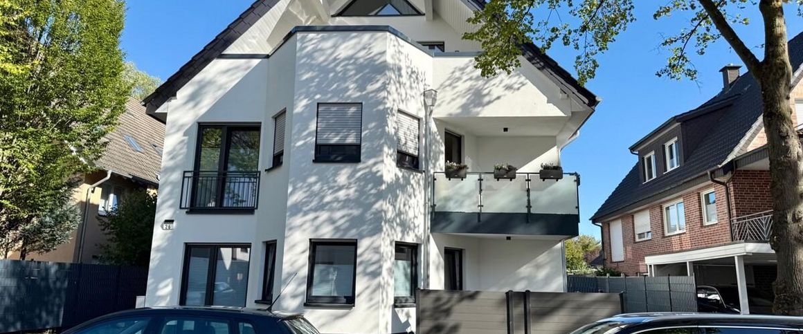 Modernes Wohnen in zentraler Lage – Erdgeschosswohnung mit Gartenanteil! - Photo 1