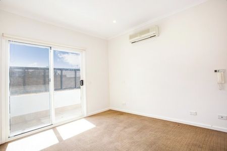 SPLIT LEVEL APARTMENT WITH SECURE PARKING - Photo 2