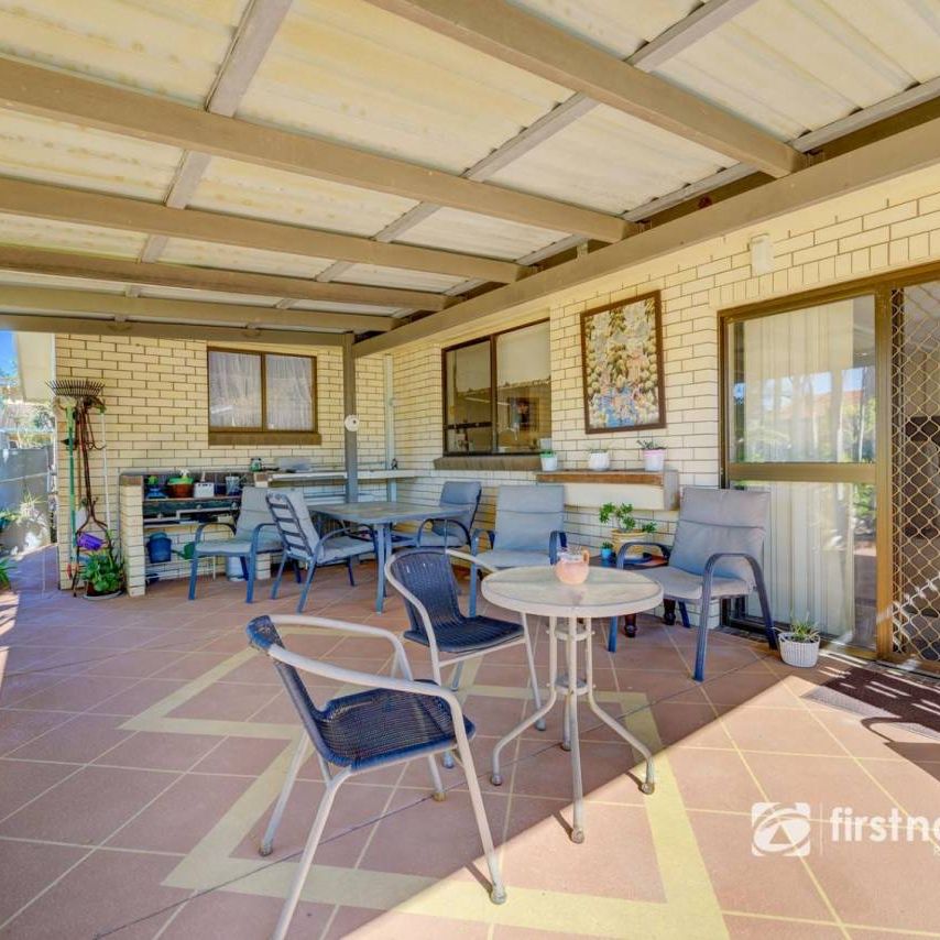 IMMACULATE BRICK HOME WITH SOLAR IN AVENELL HEIGHTS - Photo 1