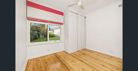 UNFURNISHED - Charming Solid-brick Home with Treetop Views - Photo 2