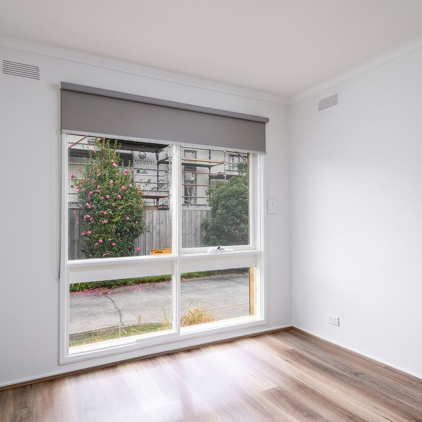 TWO BEDROOM SPACIOUS UNIT WITH DOUBLE GARAGE - Photo 1