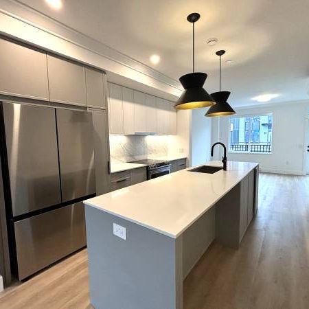 BRAND NEW 4 BEDROOM, 3.5 BATHROOM TOWNHOUSE - SEA & SKY (id 459) - Photo 1