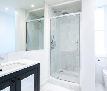 A three bedroom apartment of approximately 1,203 square feet. - Photo 5