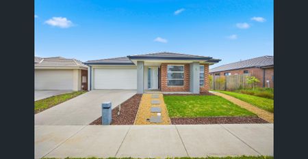 This beautifully designed home combines generous proportions with stylish finishes and thoughtful details. - Photo 4