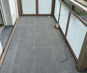 Wohlfühlwohnung mit Balkon und moderner Ausstattung im Erstbezug! R... - Foto 1