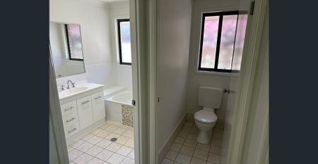 Modern Four Bedroom Home with Spacious Living - Photo 2