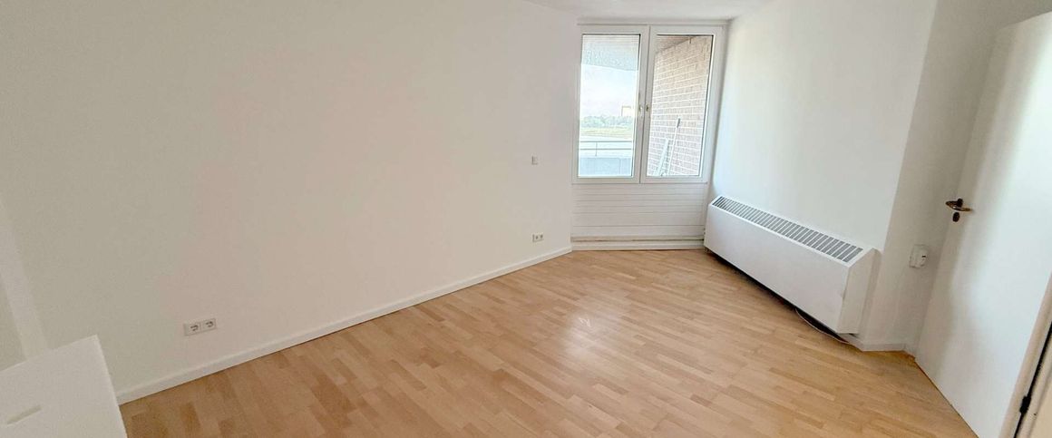 Neuss-Grimlinghausen: Traumhafte u. modernsierte 2-Zimmerwohnung mit Blick auf den Rhein - Foto 1