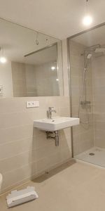 Moderne 1,5-Zi.-Wohnung mit Loggia & Rooftop Wellness - Photo 3