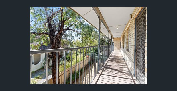 Rare 3 Bedroom Unit in Ideal Location - Photo 1