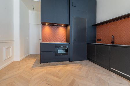 Authentiek gerenoveerd gelijkvloers appartement in Temse - Photo 3