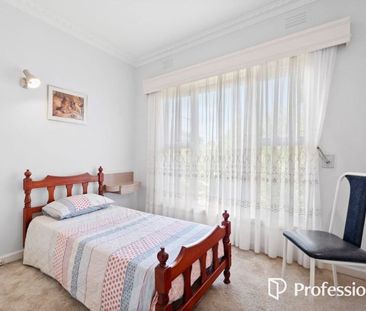 Spacious 4-Bedroom Family home in Prime McKinnon Zone - Photo 3