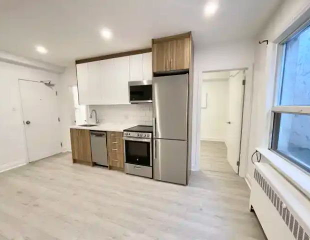 Newly Renovated 2 Bedroom + 1 Bathroom in The Heart of Eglinton West | 1980 Eglinton Avenue West, Toronto - Photo 1