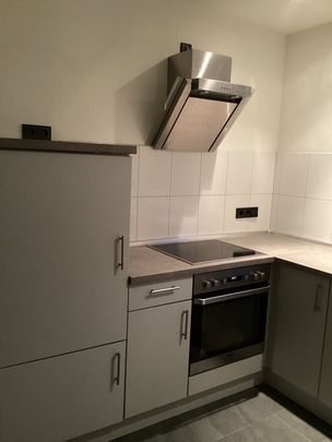 zentrales 1-Zimmer Apartment mit Einbauküche - Photo 1