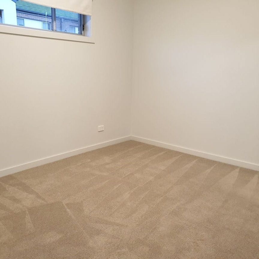 MODERN TWO BEDROOM TOWNHOUSE IN CONVENIENT LOCATION - Photo 1